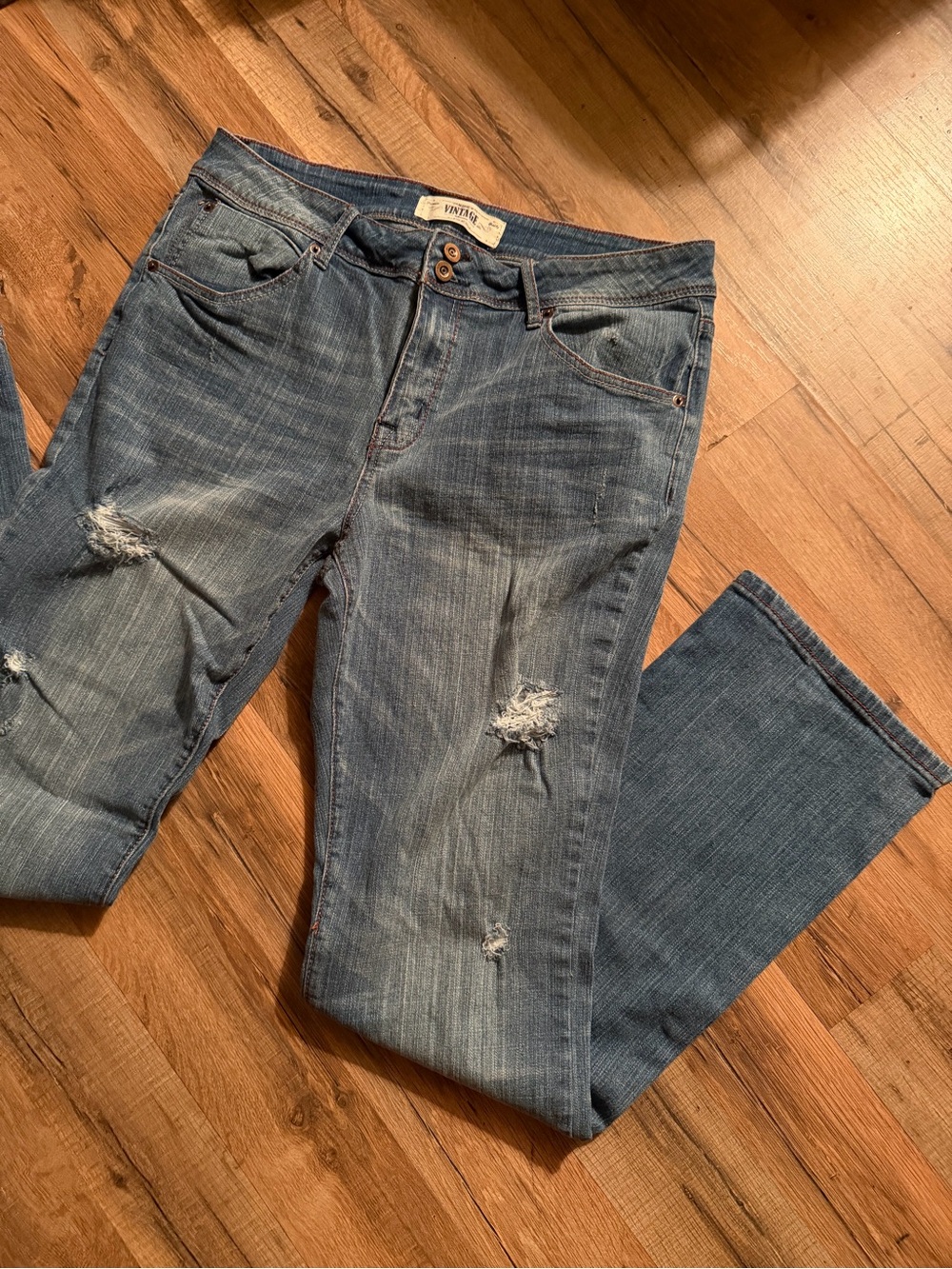 Vintage Blue Flare Jeans with Distressed Details